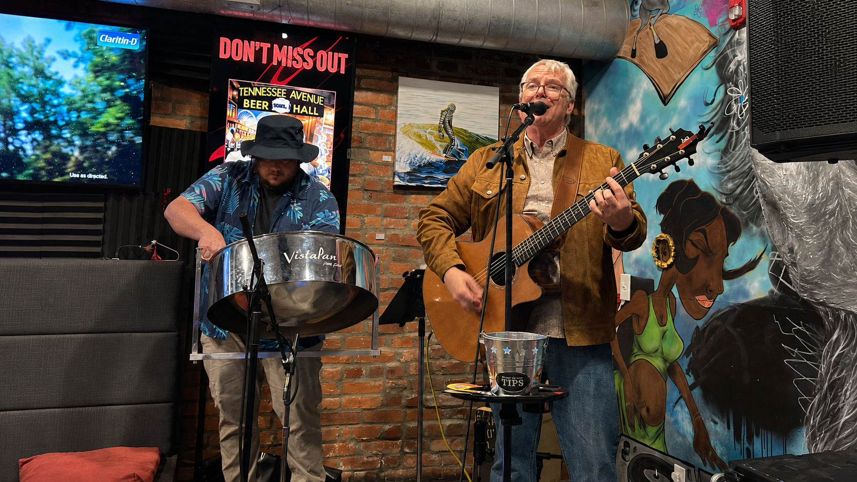 Soaking Wet Sandwiches performing live with steel pan and acoustic guitar